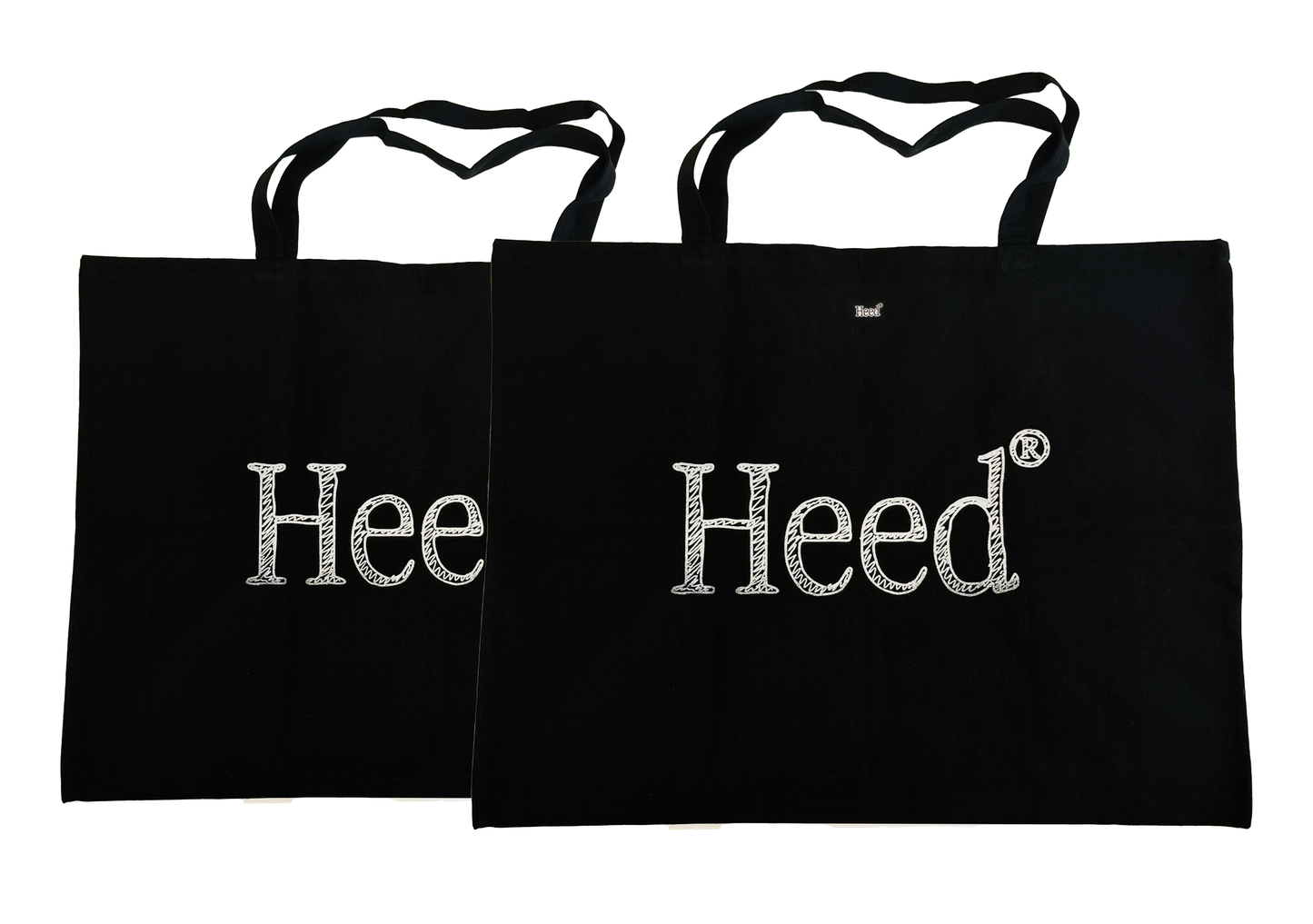 Alt text: Heed Logo Essentials XL Canvas Bag - A stylish bag featuring the iconic Heed logo, promoting mental health awareness and prioritization.""Alt text: Heed Logo Essentials XL Canvas Bag - Stylish bag with prominent Heed logo, emphasizing mental health prioritization and awareness.