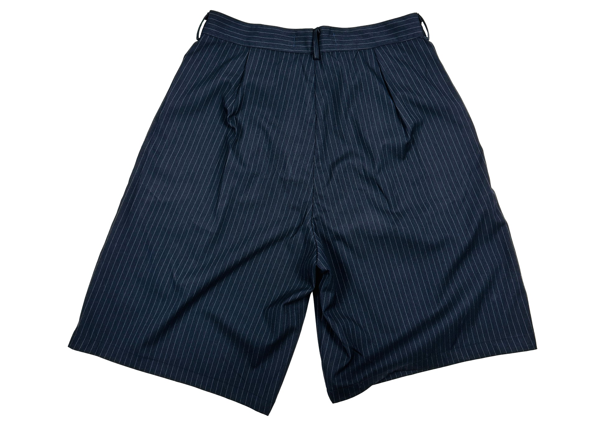 Navy-tailored pinstripe shorts. Wide leg style. Smart shorts. Mental Health and Self Care Streetwear Clothing Brand.